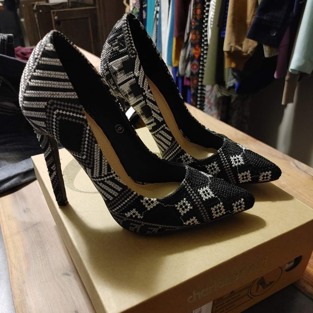 Embroidered black heels